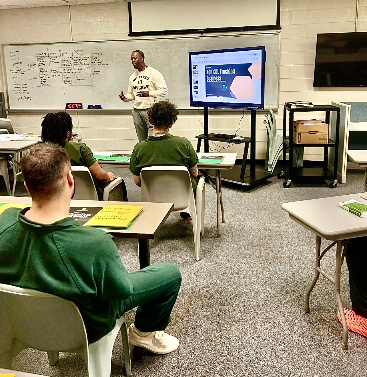 Aaron teaching in front of class